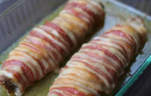 Sudėkite vyniotinį į karščiui atsparų indą, lengvai pateptą augaliniu aliejumi, ir dėkite į iki temperatūros įkaitintą orkaitę maždaug 35...